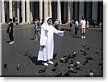 2004-07-11. Nun is feeding the birds at the Vatican (rom, italy).jpg